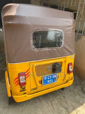 Bajaj RE 2023 Yellow