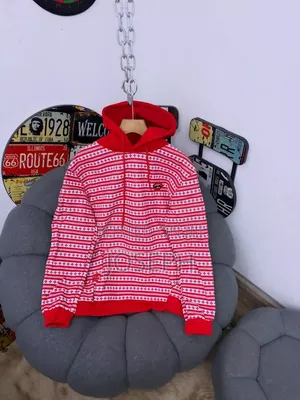 Red and White Patterned Hoodie With a Comfortable Hood
