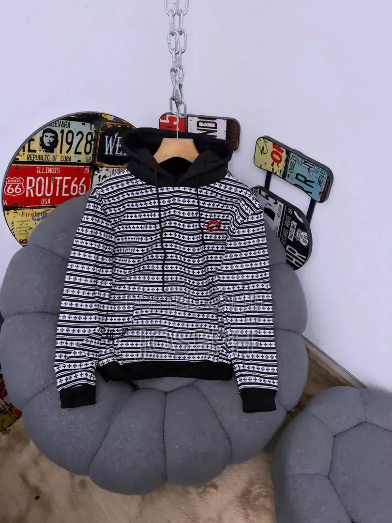 Red and White Patterned Hoodie With a Comfortable Hood
