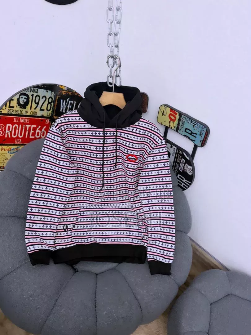 Red and White Patterned Hoodie With a Comfortable Hood