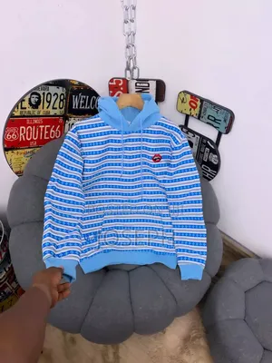Red and White Patterned Hoodie With a Comfortable Hood