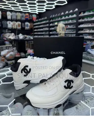 White and Black Chanel CC LSneakers