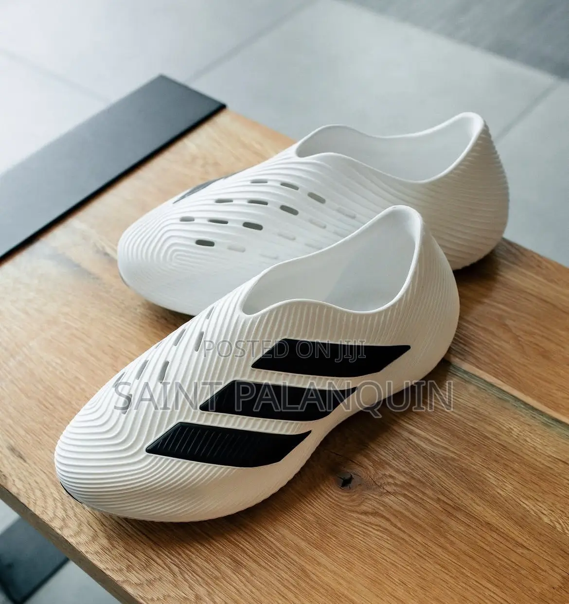 The White Adidas Purechill Slip-on Recovery Shoes a Ridged Molded