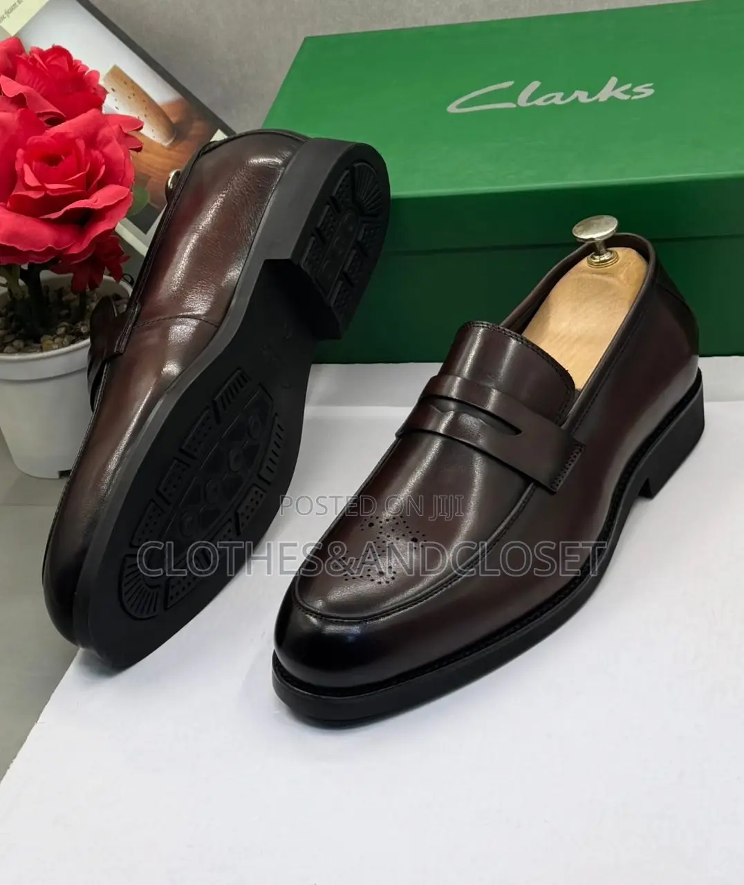 Dark Brown Leather Clarks Penny Loafers Featuring a Classic Slip-On
