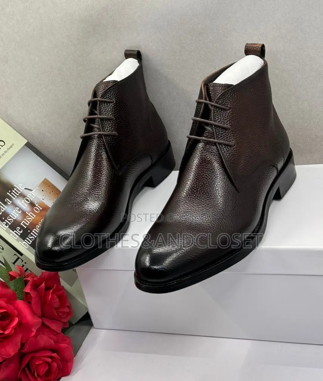 Dark Brown Leather Chukka Boots With Lace-Up Closures and Block Heels.