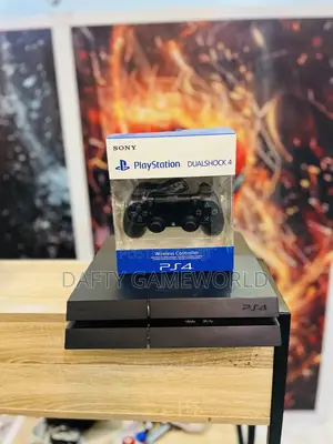 PS4 FAT WITH 2 Controllers and Loaded Games
