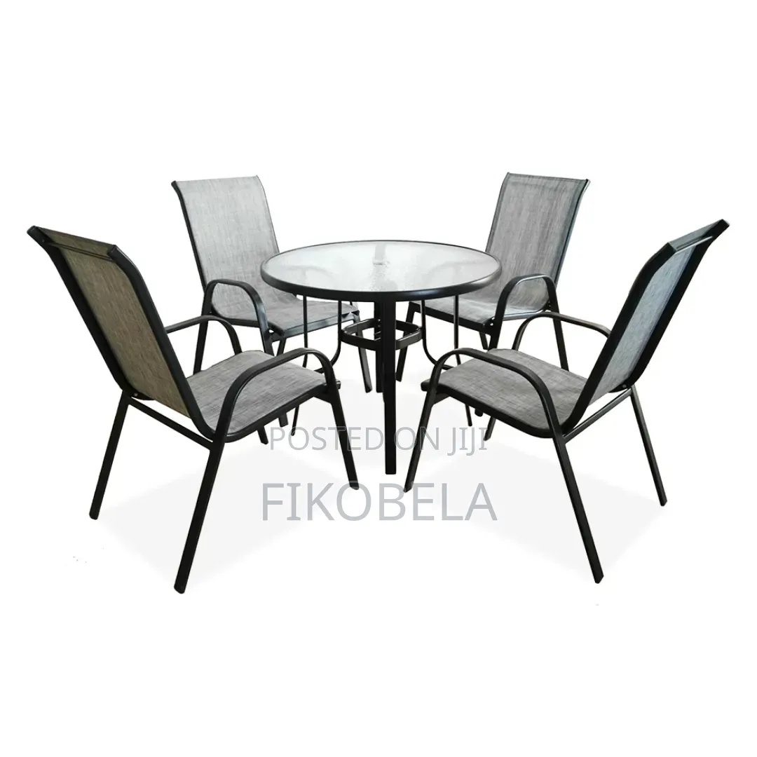 4 Chairs 1 Table and Umbrella