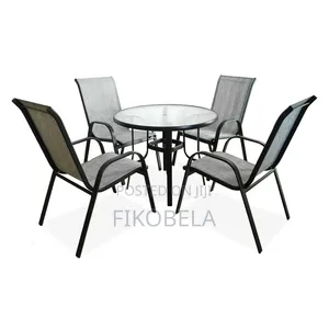 4 Chairs 1 Table and Umbrella