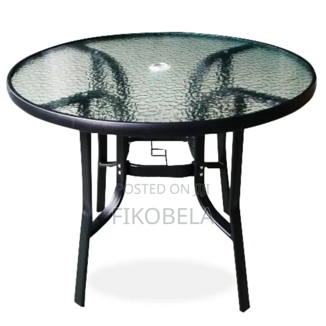 4 Chairs 1 Table and Umbrella