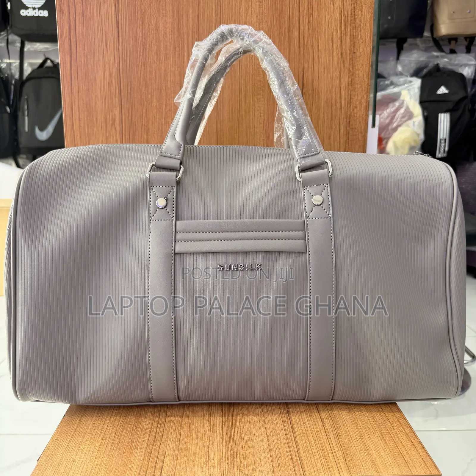 Sunsilk Strip Leather Duffle Bag