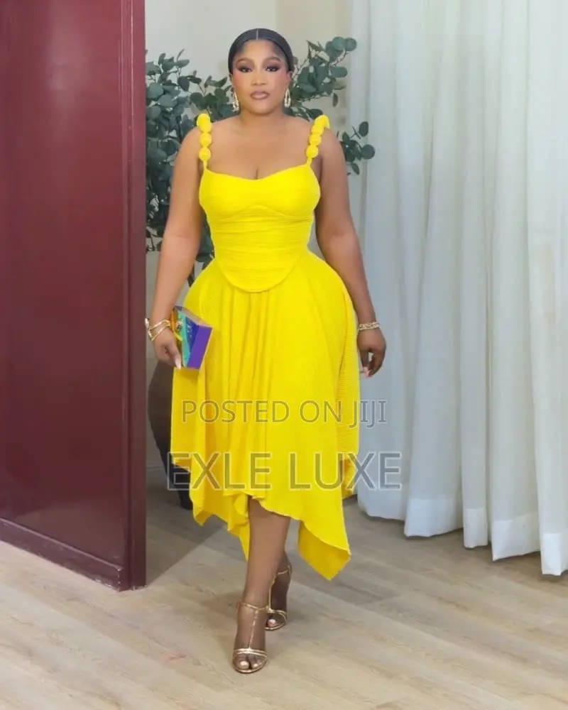Vibrant Yellow Corset Top & Asymmetric Skirt Set – Ladies Wear