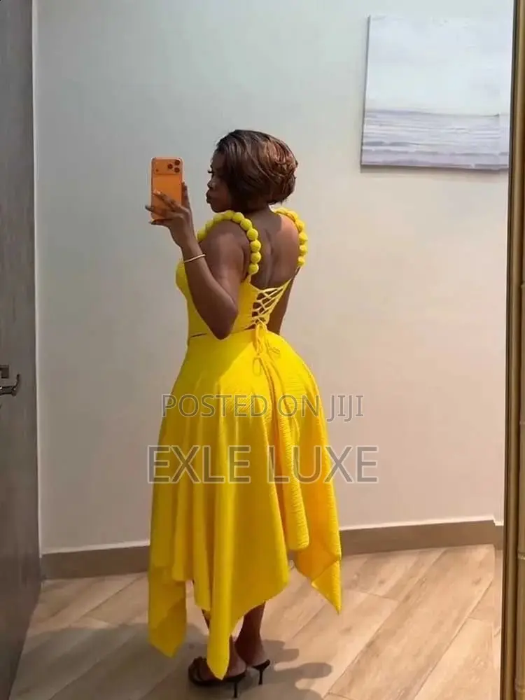Vibrant Yellow Corset Top & Asymmetric Skirt Set – Ladies Wear