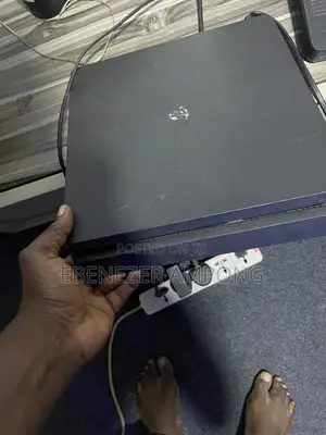 PS4 Slim With 2controllers and 5games