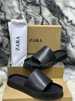 The Black Slide Sandals With a Wide Single Strap