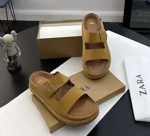 A Pair of Tan Men's Dual-Strap Leather Sandals