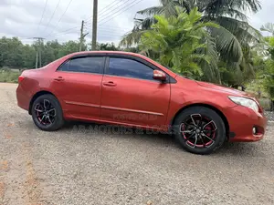 Toyota Corolla Altis 2010 Maroon