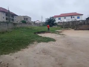 Three (3) Plots of Land at Medoma Near Ahwia New Market.