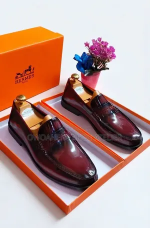 Hermès Paris Polished Leather Penny Loafers