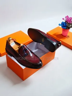 Hermès Paris Polished Leather Penny Loafers