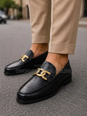 Tod's Croc Black Leather Chain Loafers.