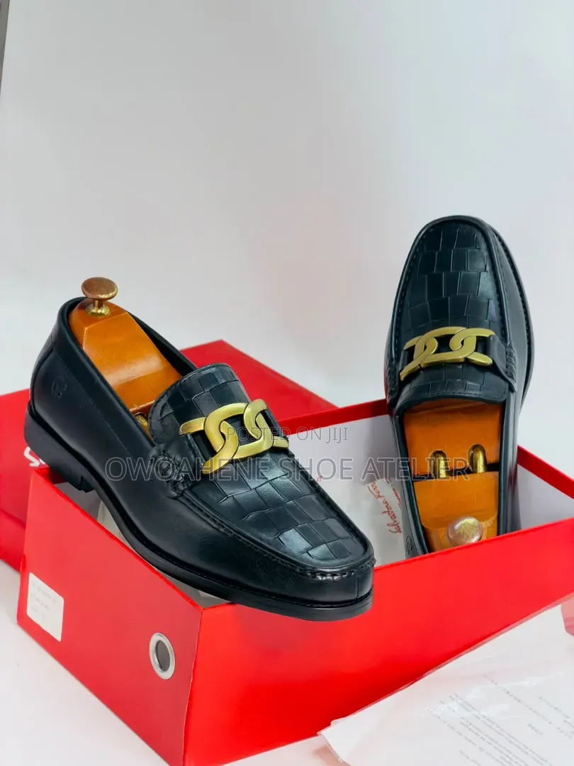Tod's Croc Black Leather Chain Loafers.
