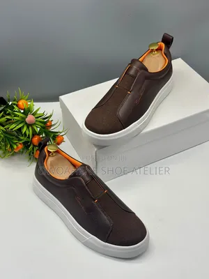 Santoni Premium Leather Slip-on Sneakers.