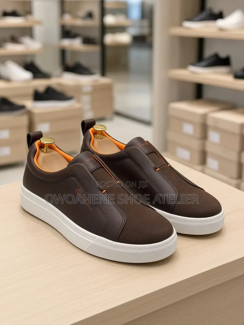 Santoni Premium Leather Slip-on Sneakers.