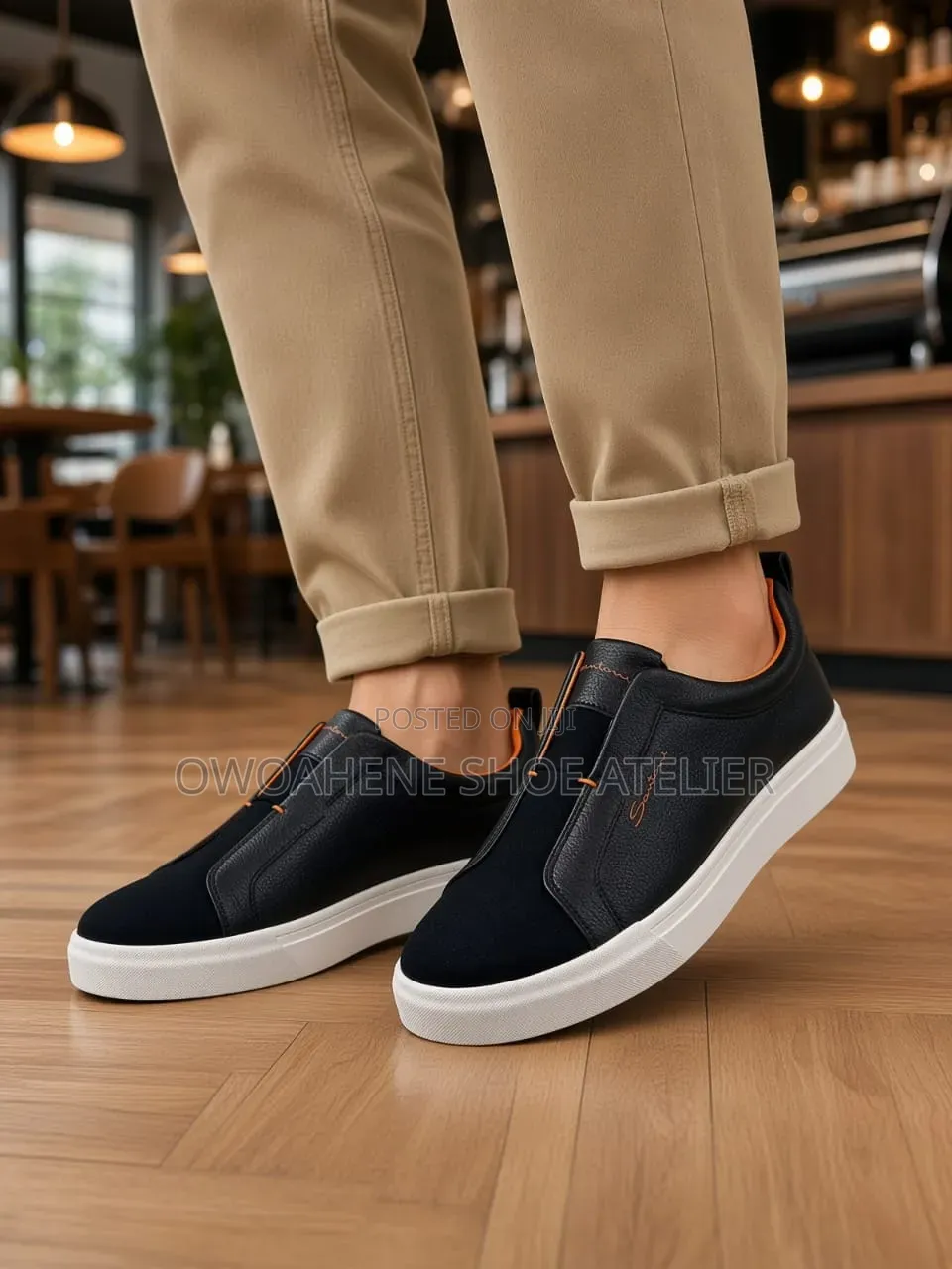 The Selected Item Is a Pair of Santoni Laceless Leather Slip-on Snea