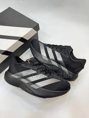 Adidas Adizero EVO SL Sneakers in Black and Metallic Silver Colorway