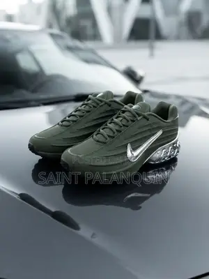 The Image Shows the Olive Green Nike NOCTA Glide Sneakers