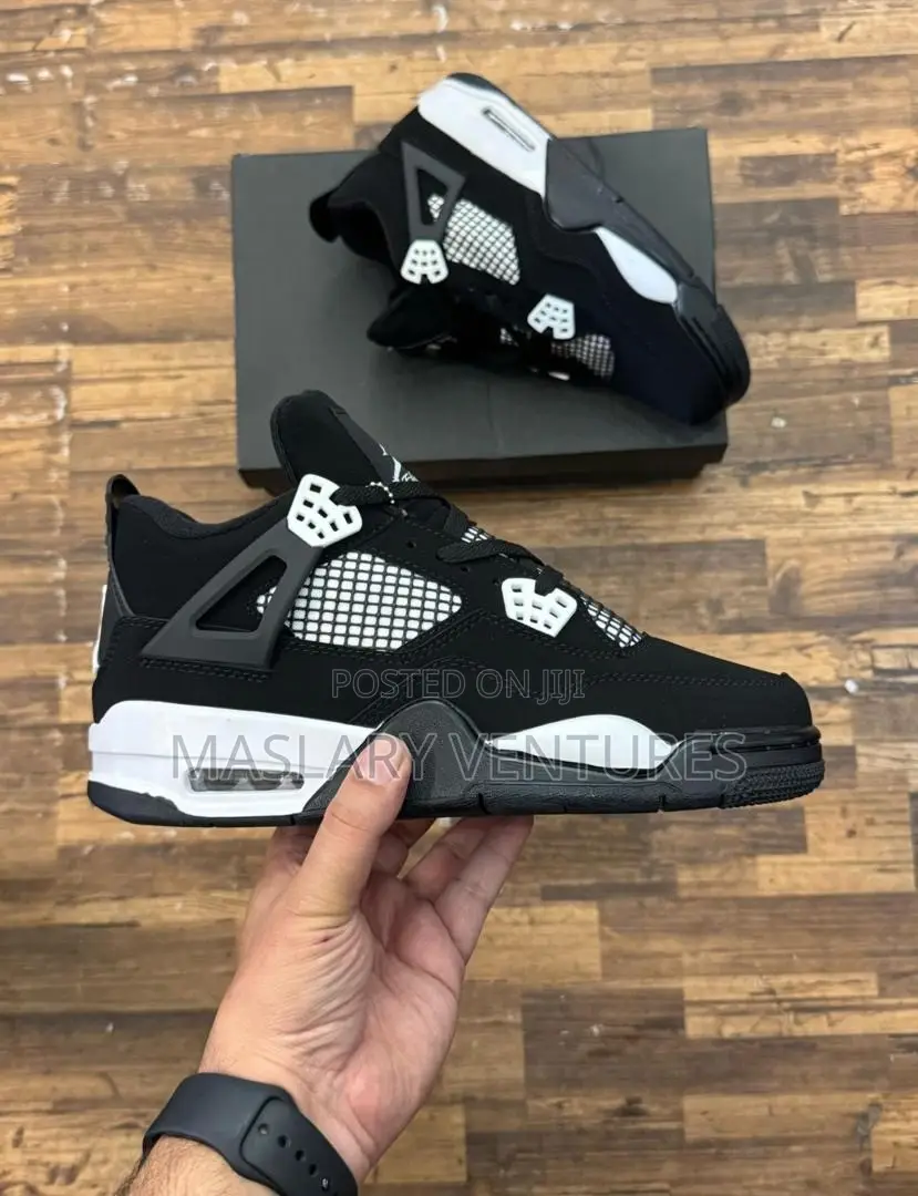 Air Jordan 4 Retro- White Thunder