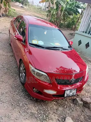 Toyota Corolla Base 4dr Sedan (1.8L 4cyl 5M) 2010 Red