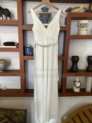 White Maxi Dress Featuring a v-Neck Wrap Bodice