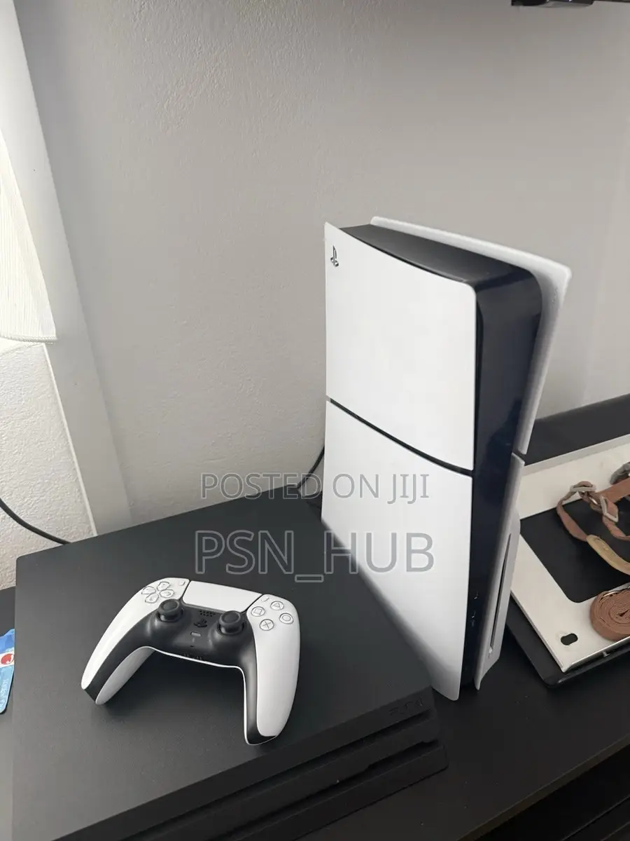 PlayStation 5 Slim(disc Edition) With Fc 26 and Four Games
