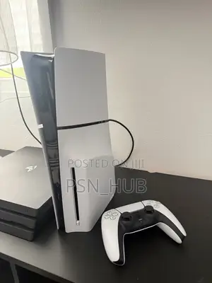 PlayStation 5 Slim(disc Edition) With Fc 26 and Four Games