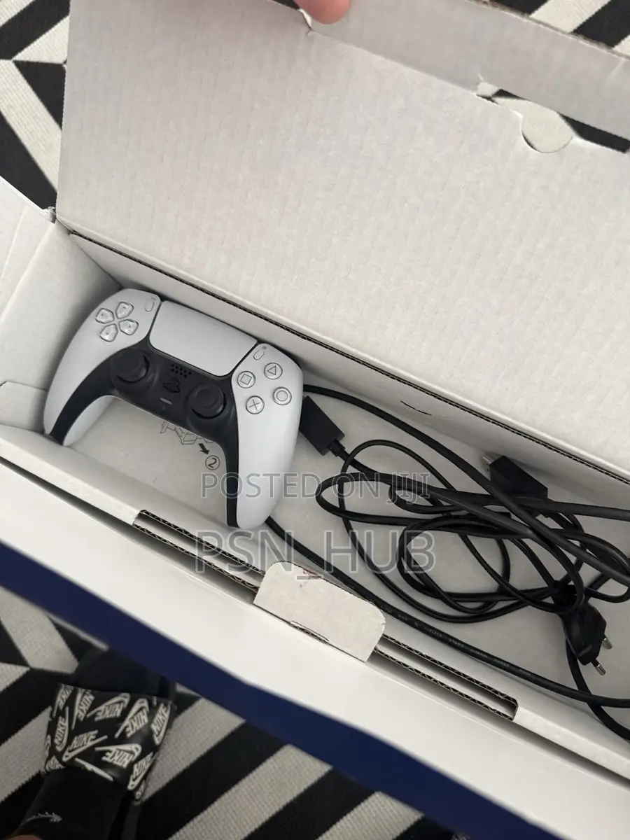 PlayStation 5 Slim(disc Edition) With Fc 26 and Four Games