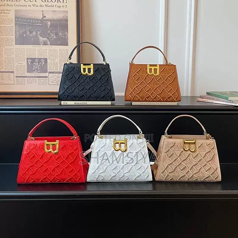 Elegant Brown Structured Handbag – Gold Detail
