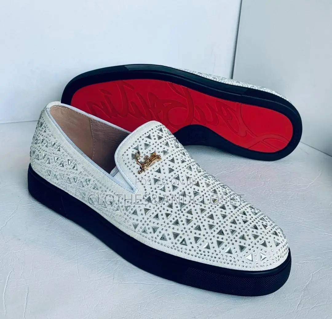 Christian Louboutin Slip-on Loafer Featuringan Intricatecutout Pattern