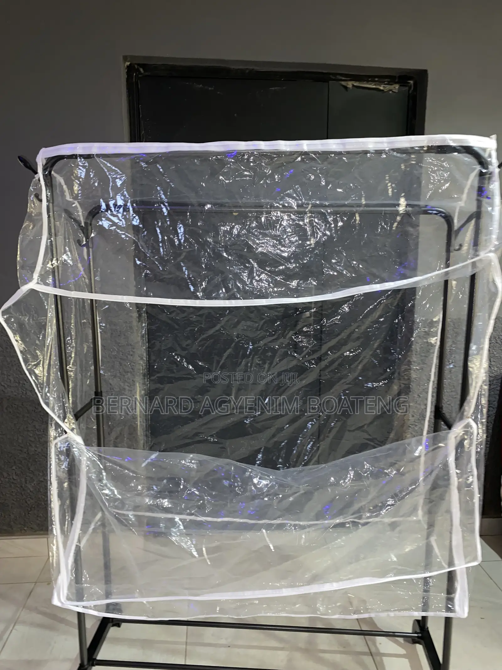 Double Clothes Rack With Dust Cover
