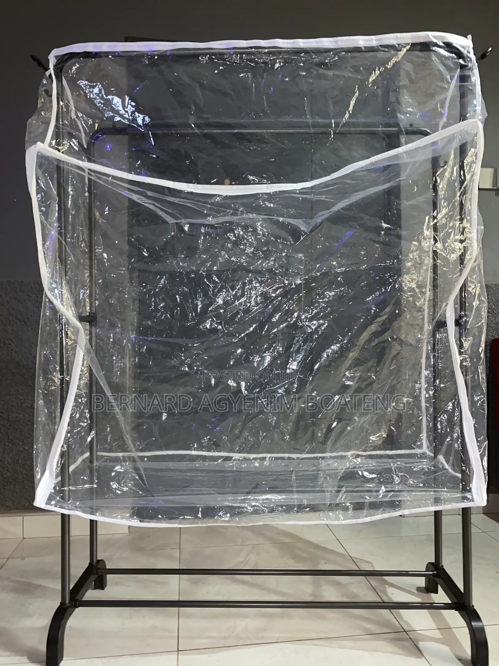 Double Clothes Rack With Dust Cover