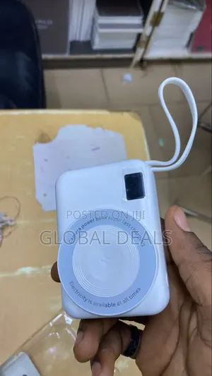 Camera Shaped Fast Charging Wireless Powerbank With External Cables