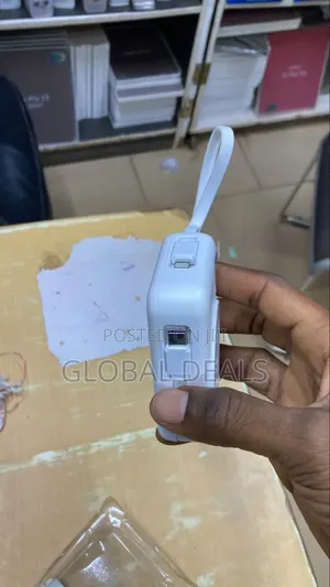 Camera Shaped Fast Charging Wireless Powerbank With External Cables
