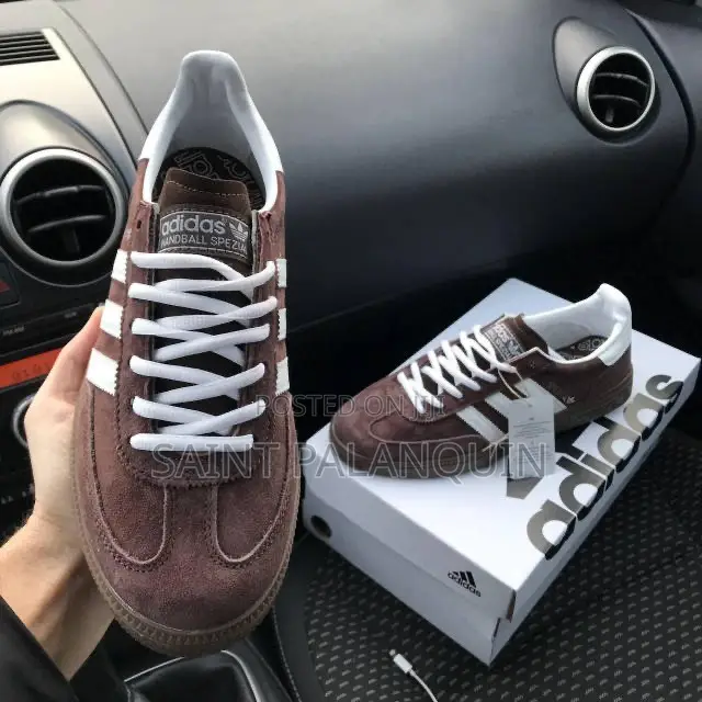 A Pair of Brown and White Adidas Handball Spezial Sneakers