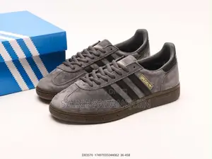 A Pair of Grey Suede Adidas Handball Spezial With Dark Grey Stripes