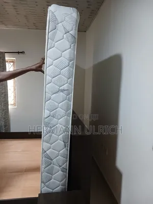 Foreign Bed- Frame and Mattress( Fairly Used)