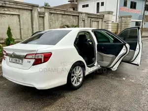 Toyota Camry SE Sport 4dr Sedan w/Prod. End 11/13 (2.5L 4cyl 6A) 2014