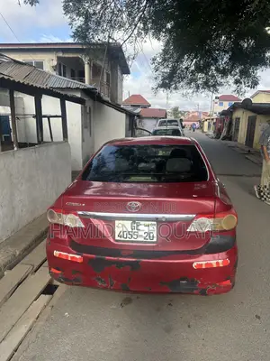 Toyota Corolla Base 4dr Sedan (1.8L 4cyl 5M) 2011 Red