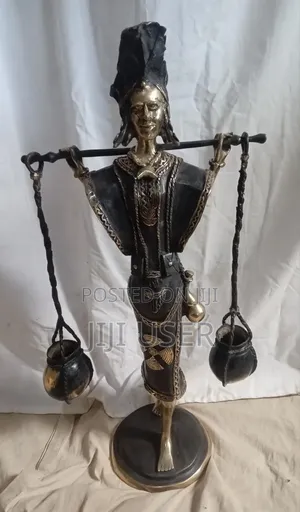 West African Water Carrier. FIgurine From Burkina Faso.
