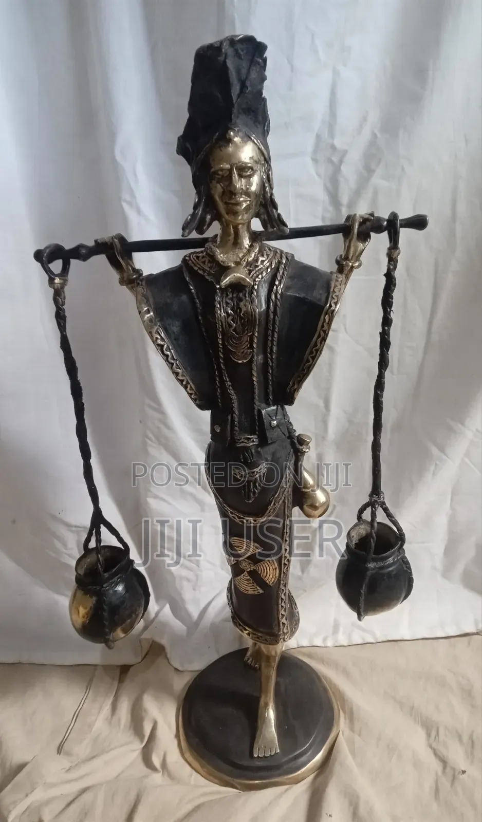 West African Water Carrier. FIgurine From Burkina Faso.