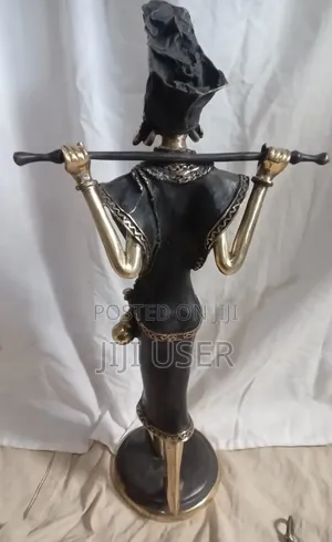 West African Water Carrier. FIgurine From Burkina Faso.